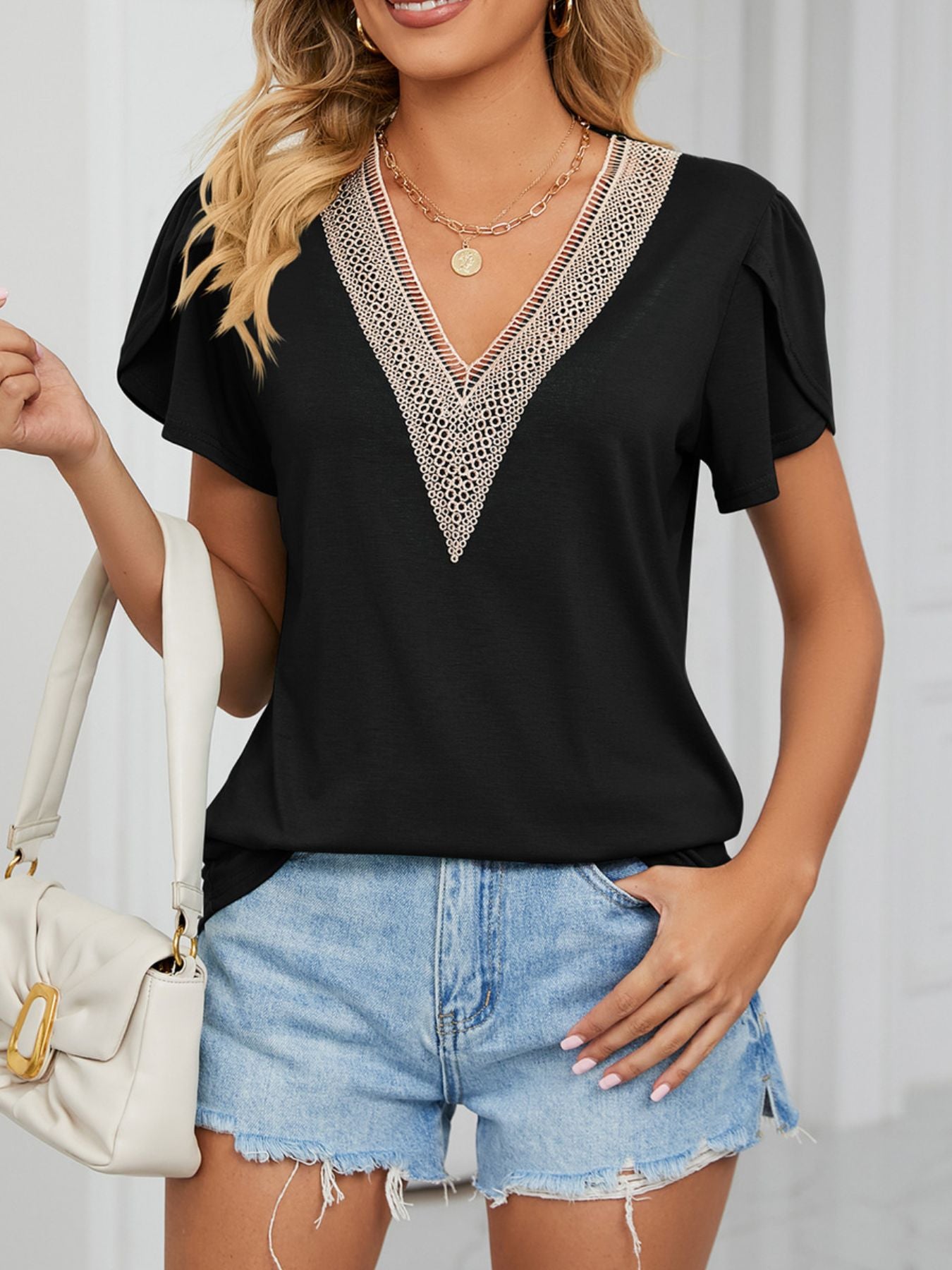 Cedar & Moore V-Neck Petal Sleeve Top in black with lace-trim V-neck by Trendsi