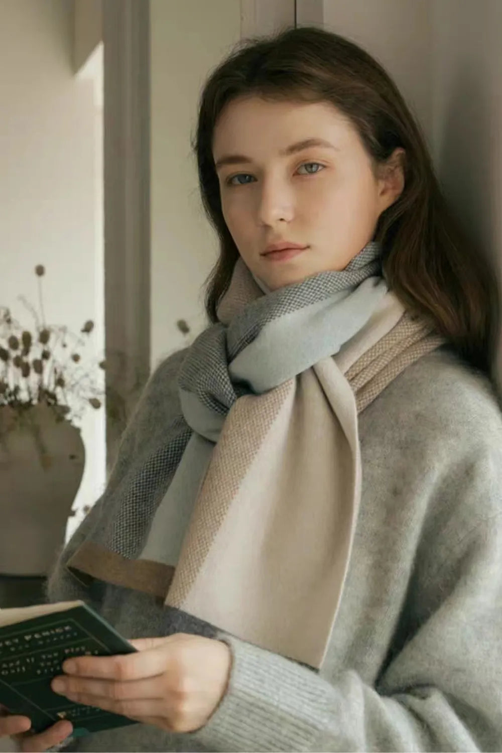 Contrast acrylic scarf with sage and beige panels, dark edge trim, soft woven texture