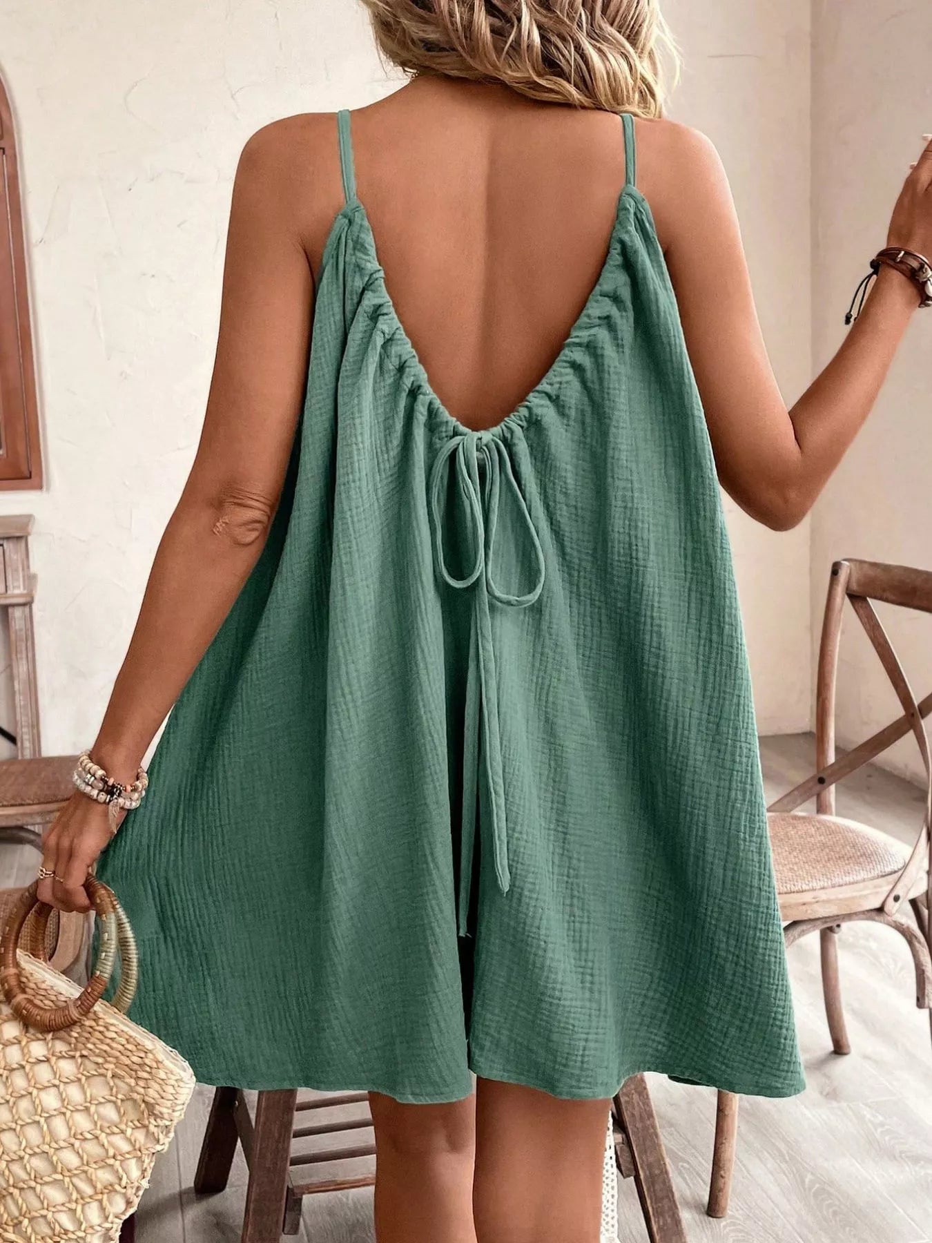 Cedar & Moore Casual loose green spaghetti-strap backless mini dress with tie back