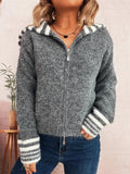 Gray zip-up cardigan with striped hood and ribbed striped cuffs, front zipper