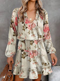 Ivory floral printed tie-neck long-sleeve dress with tiered skirt