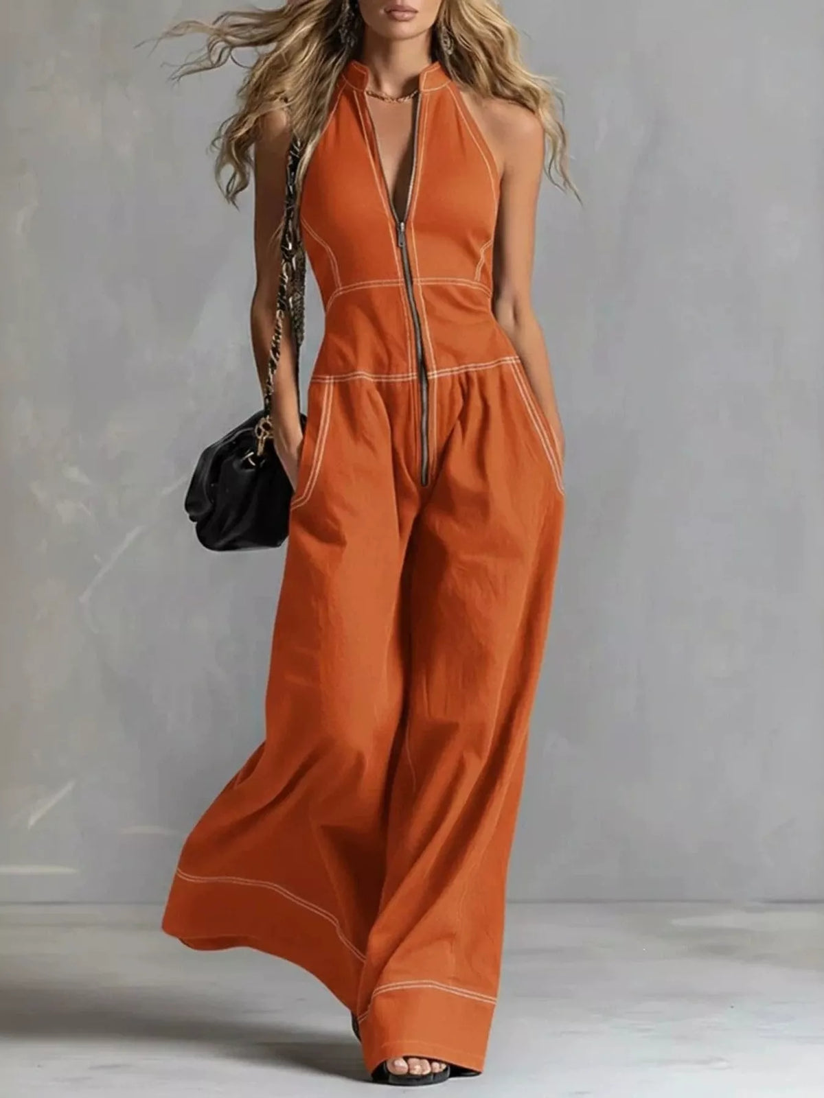 Zip-front sleeveless wide-leg jumpsuit, orange with front zipper and wide-leg drape