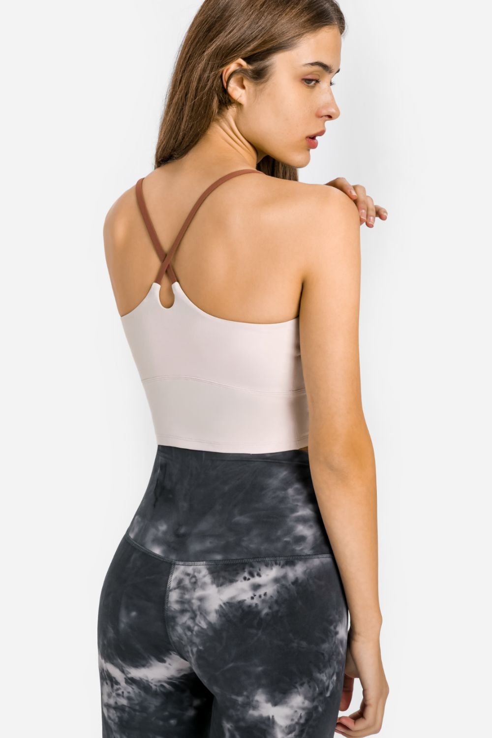 Sports cami with crisscross open back and teardrop cutout, light pink