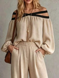 Beige off-shoulder ribbed knit top with cutout strap neckline and wide-leg pants
