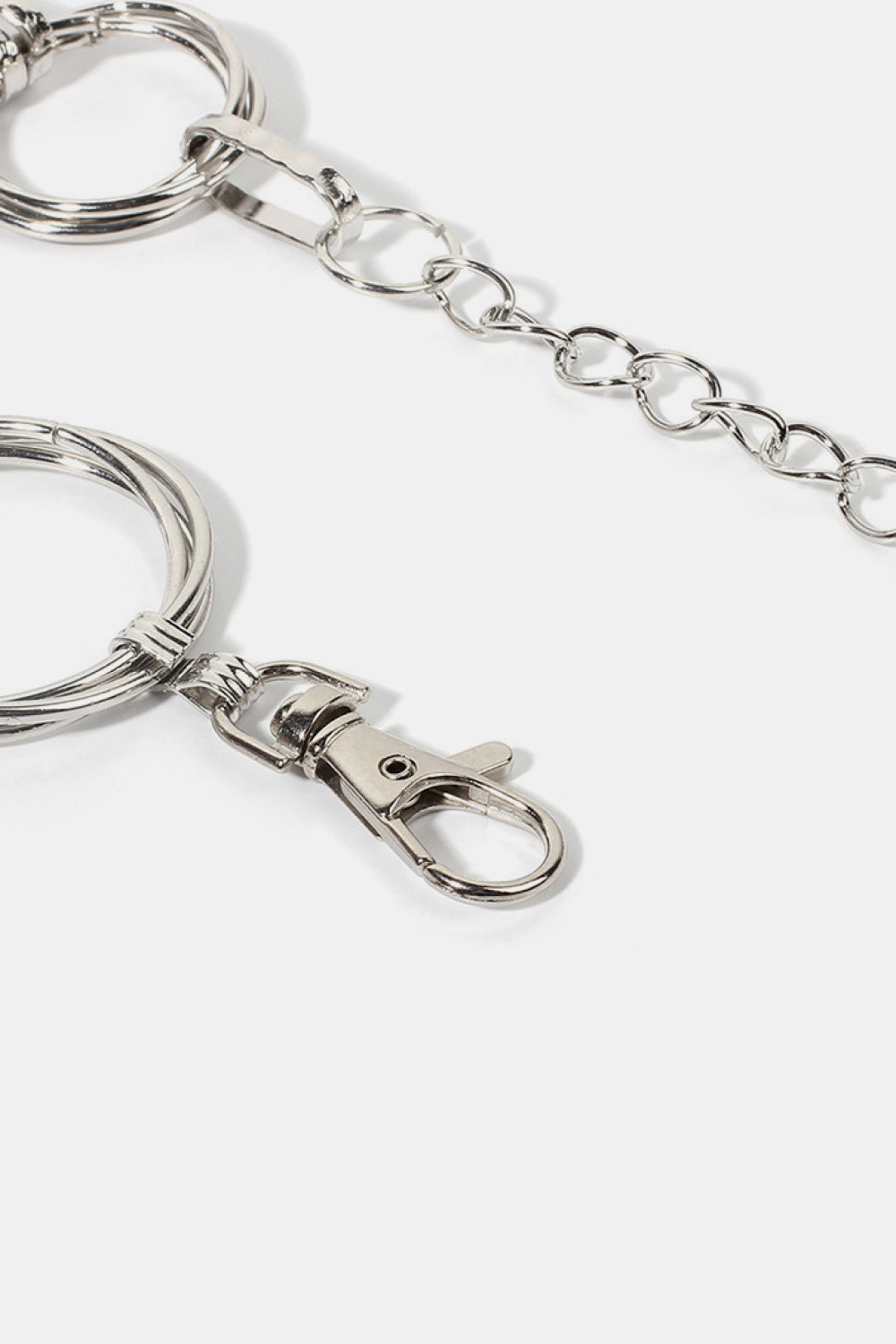 Silver metal chain belt clasp with curved spring rings and connector chain