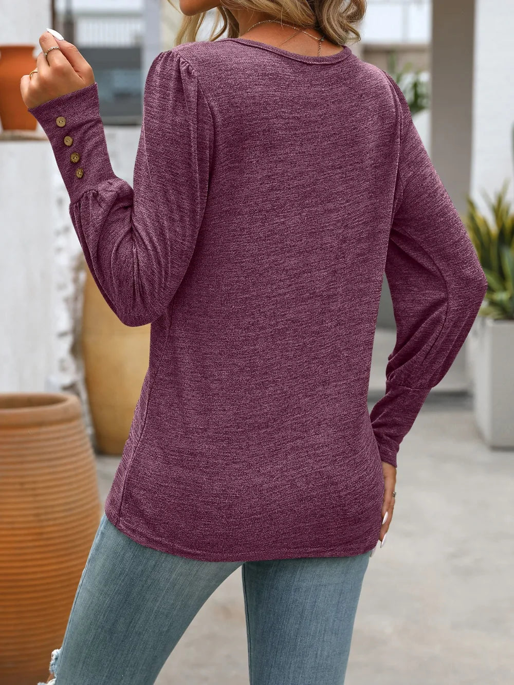 Purple long sleeve round-neck t-shirt, back view with relaxed fit