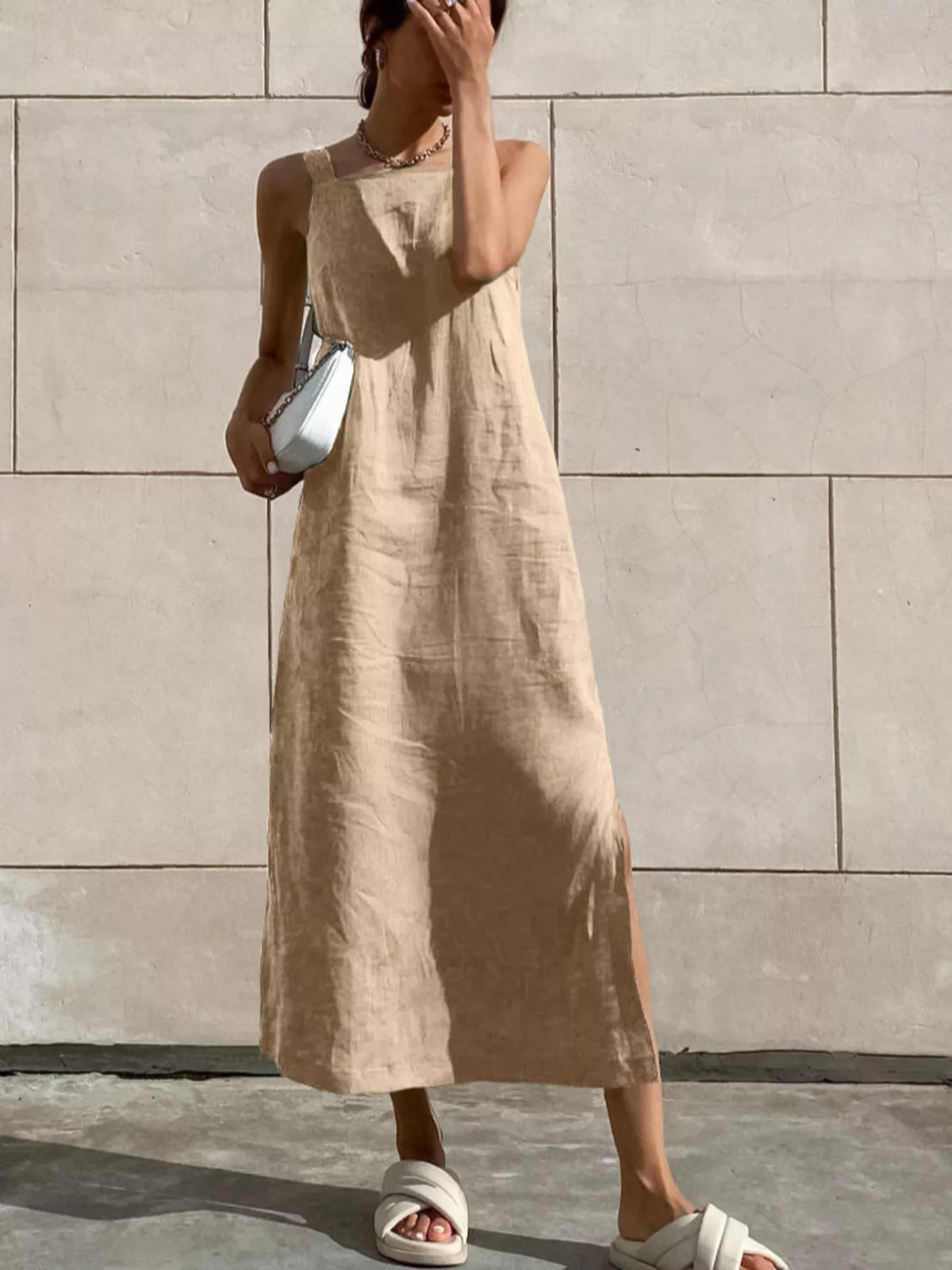 Light beige sleeveless cotton-linen midi dress with side slit and scoop neckline