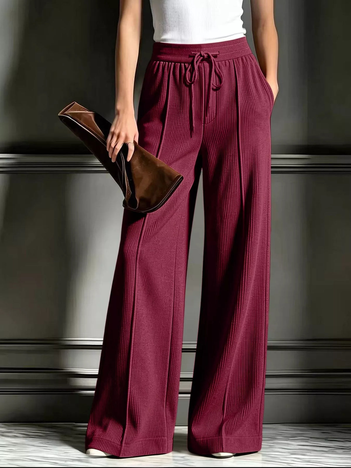 High-waisted wide-leg ribbed corduroy pants in wine red with drawstring waist