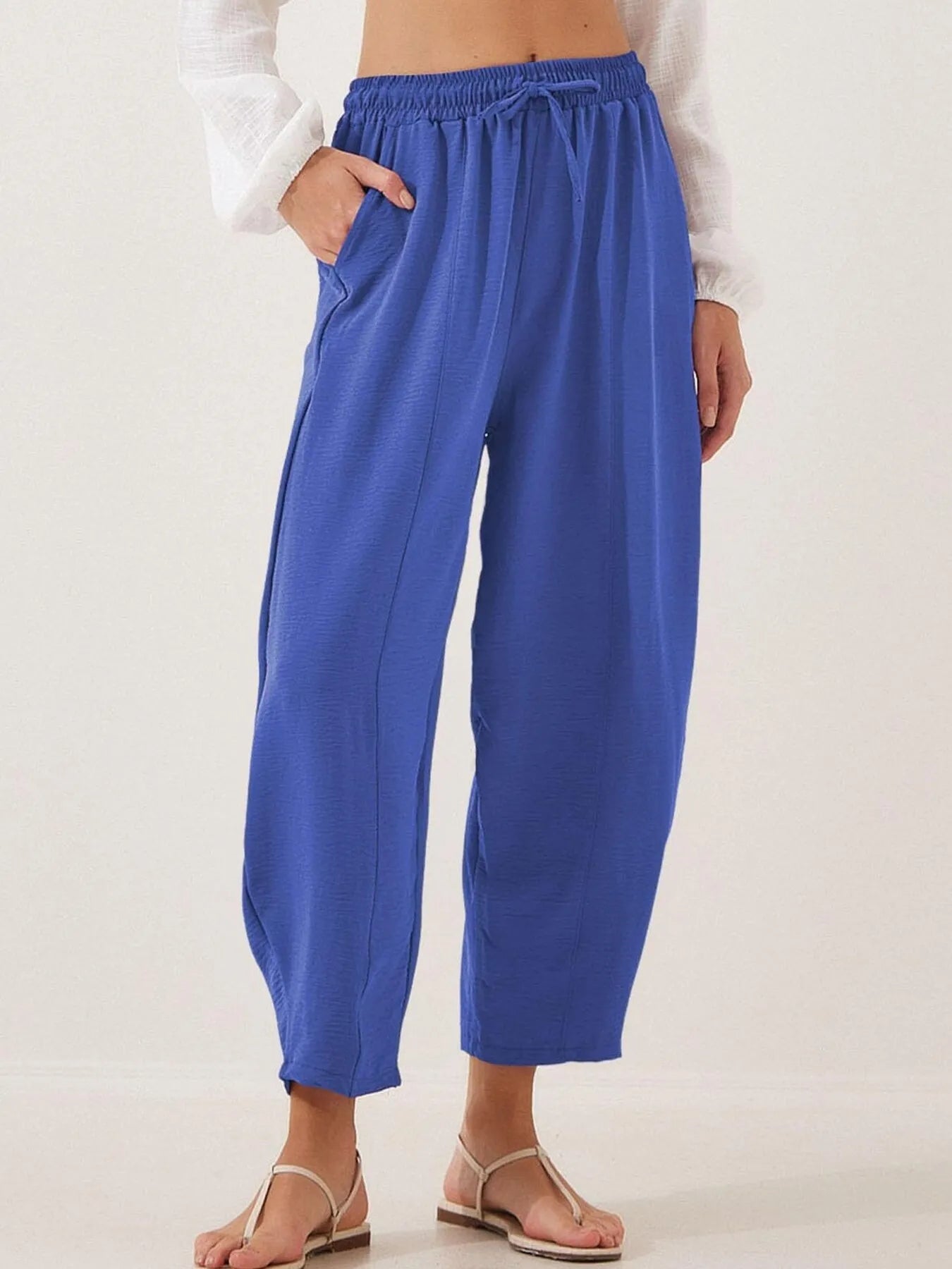 Royal blue drawstring wide-leg cropped pants with elastic waistband and roomy legs