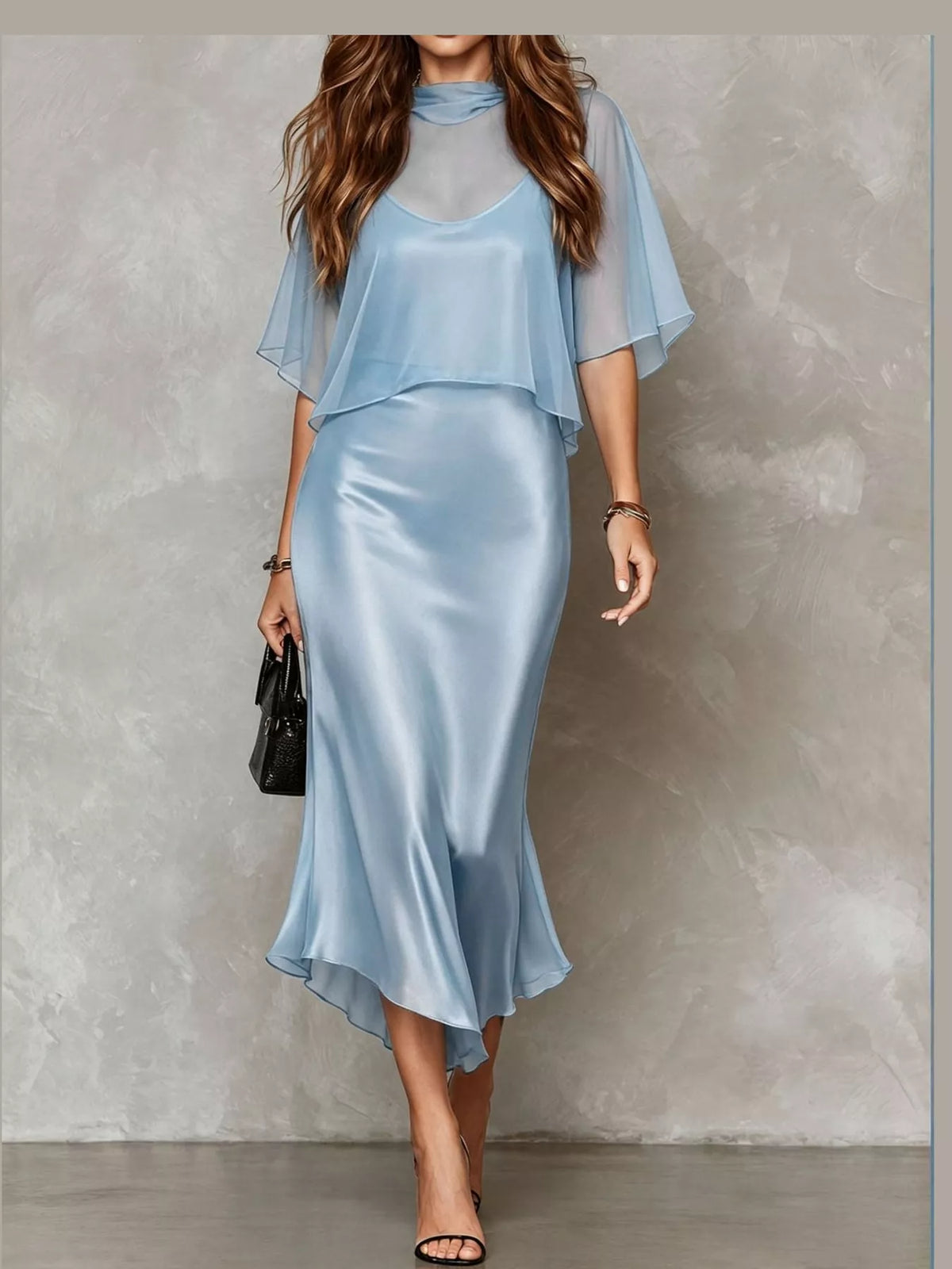 Light blue satin slip midi dress with sheer cape sleeves and layered neckline