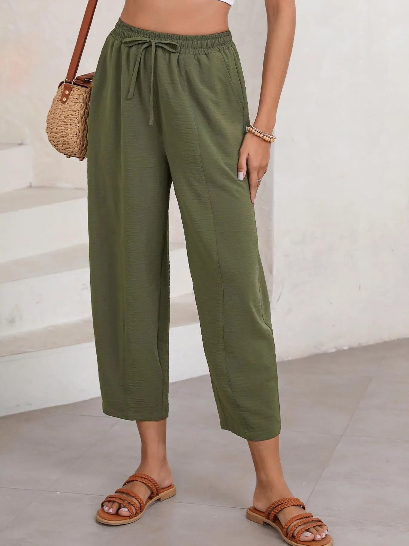 Olive green cropped wide-leg pants, elastic drawstring waist, relaxed fit