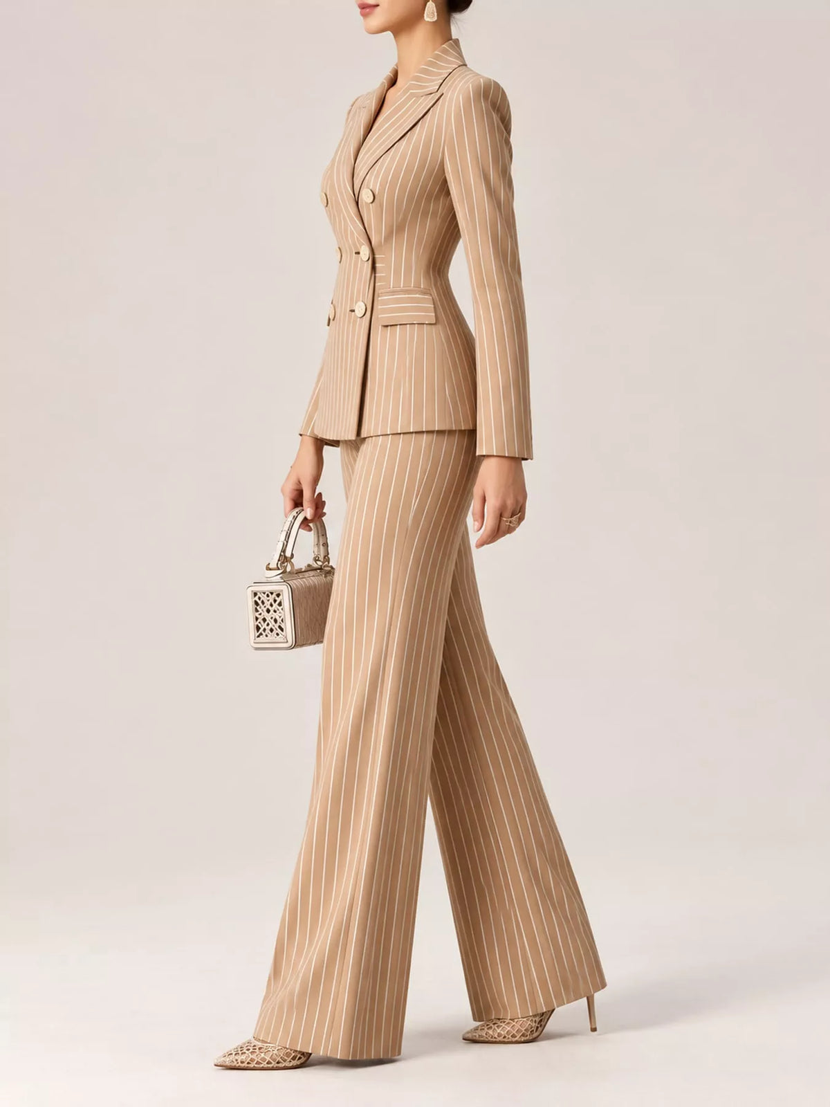 Apricot pinstripe double-breasted blazer and wide-leg pants set with gold button detail.