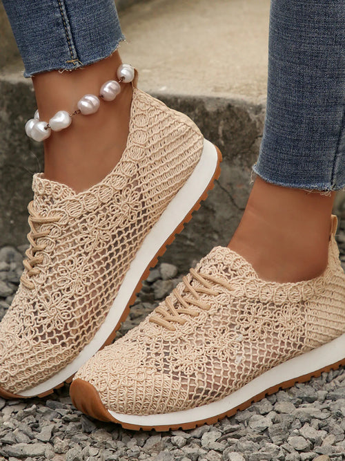 Beige mesh lace-up sneakers with white soles, lace-up front