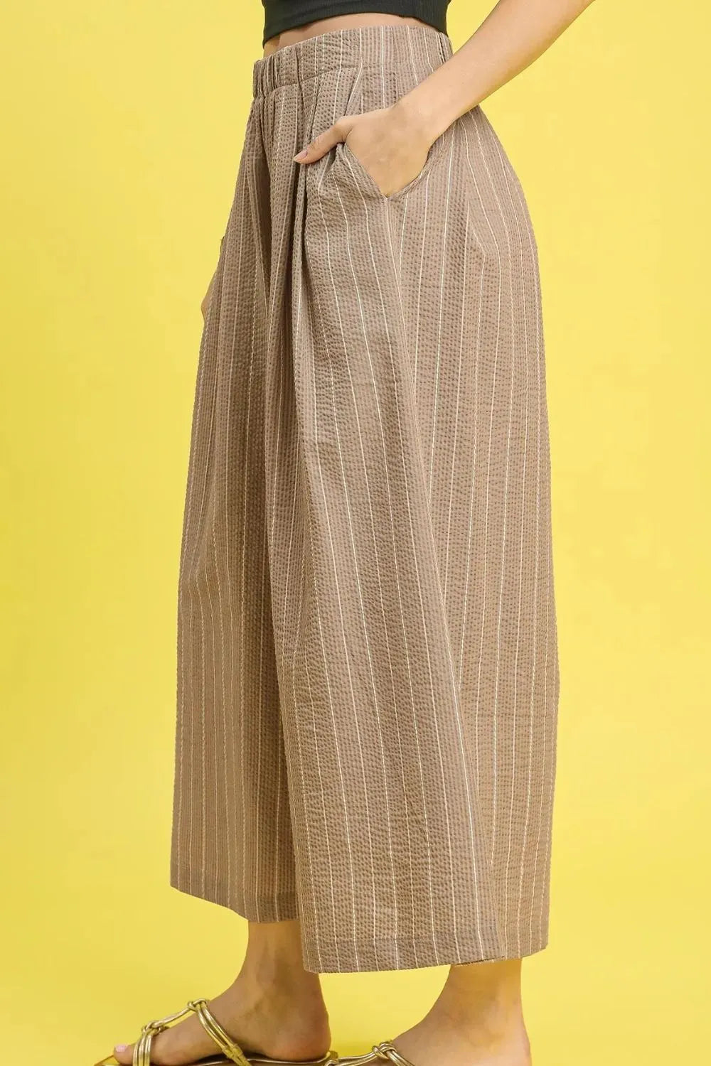 Camel pinstripe palazzo pants with elastic waistband and roomy wide-leg fit