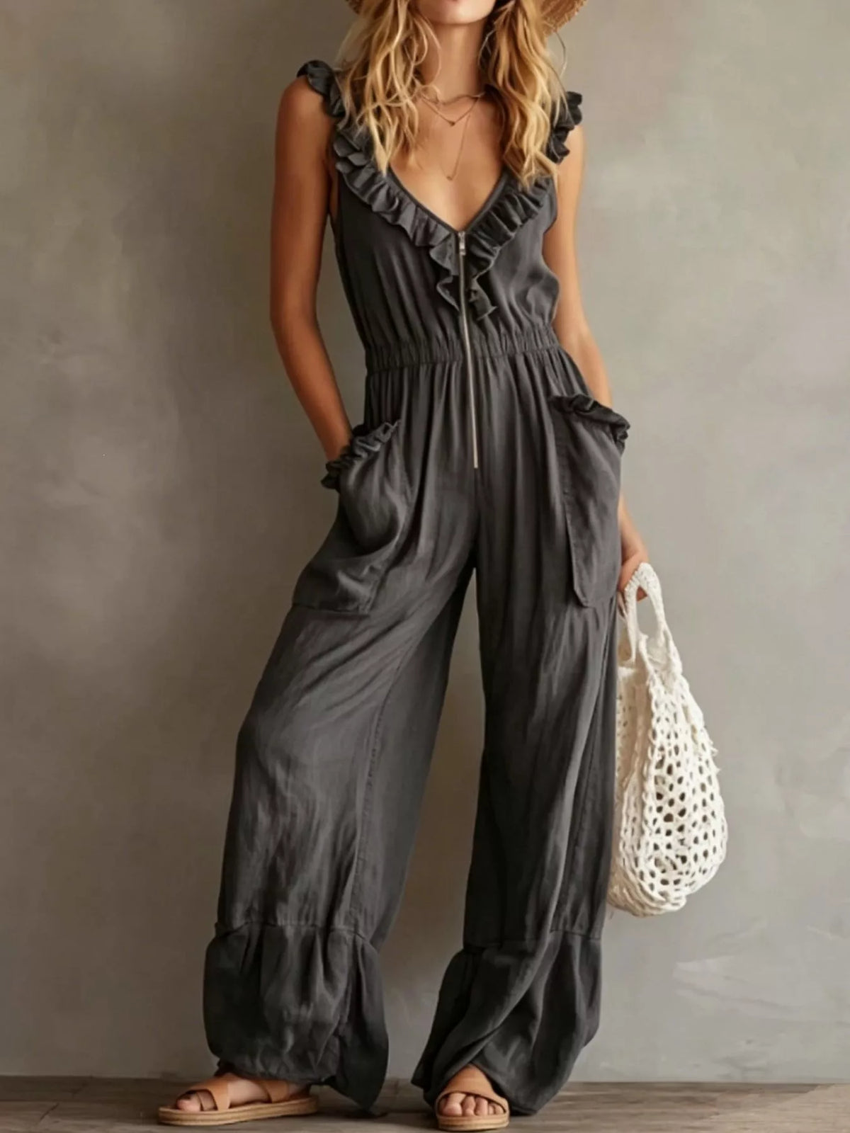 Charcoal dark ruffled V-neck sleeveless jumpsuit with tie front and wide-leg pockets