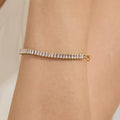 Gold-plated rhinestone chain bracelet with clear stones and small box clasp