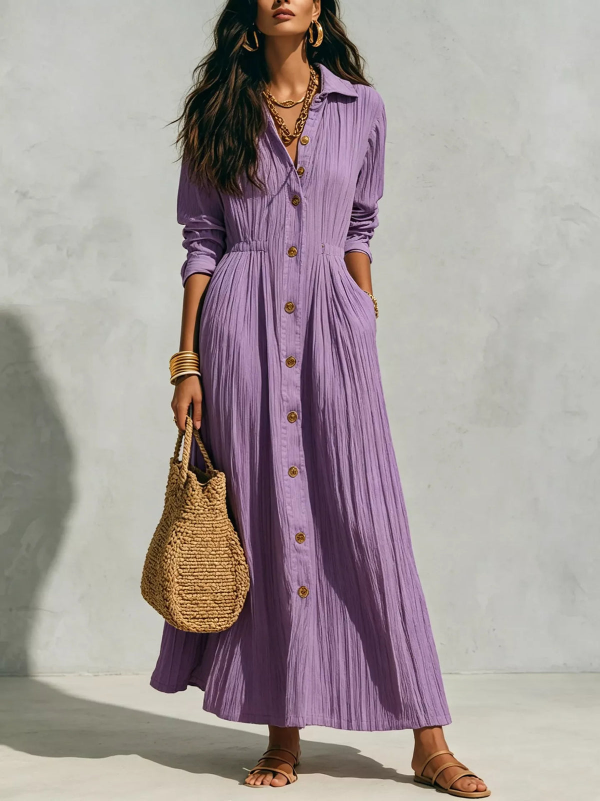 Purple textured button-down maxi dress with long sleeves and gathered waist, gold buttons