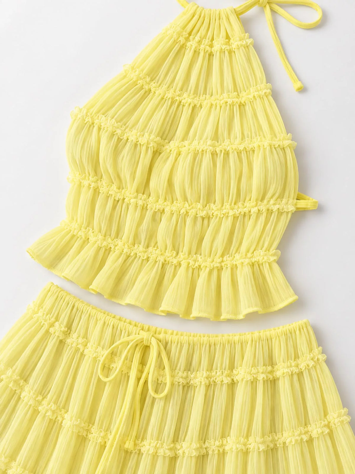 Yellow ruffled halter crop top and tiered maxi skirt set with neck tie