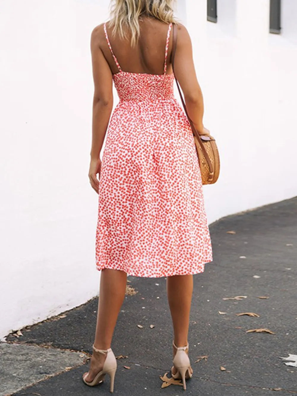 Pink floral cami dress back view with bow tie straps and open back neckline