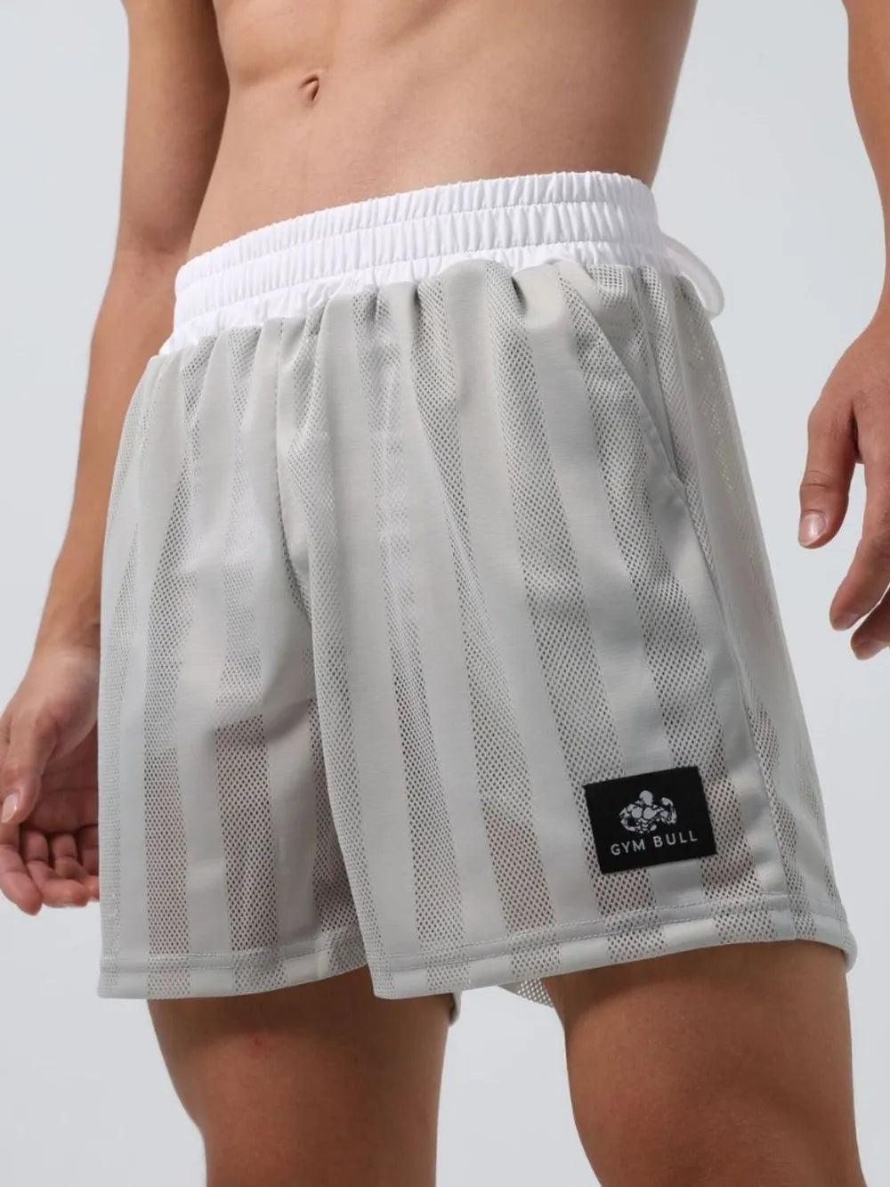 White elastic waist mesh shorts with drawstring and GYM BULL logo patch