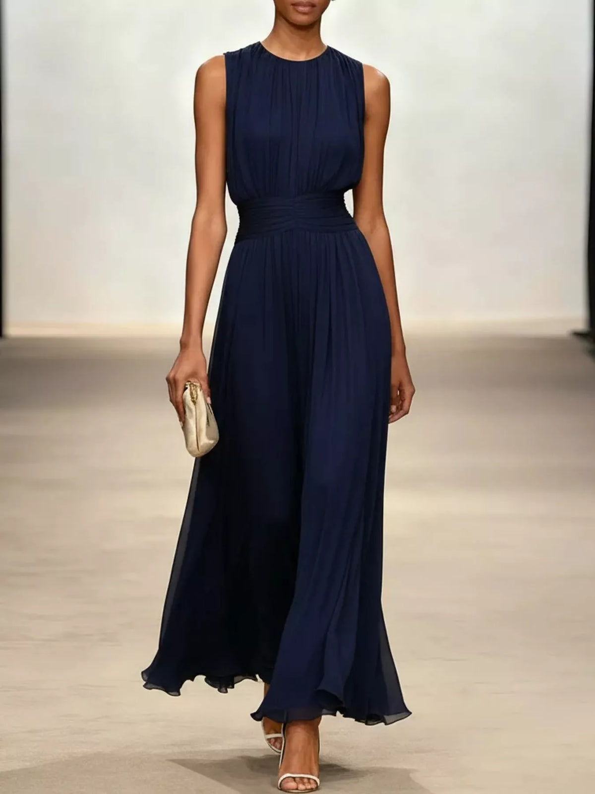 Navy sleeveless ruched chiffon maxi dress with pleated bodice and long skirt