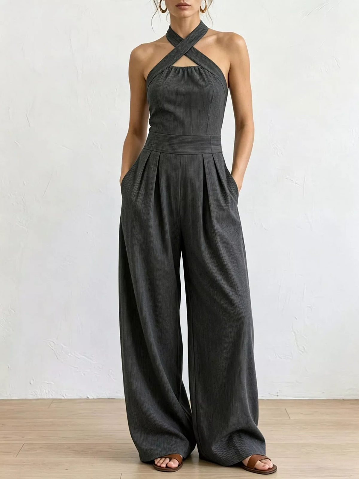 Charcoal halter linen jumpsuit with high waist and flowy wide legs