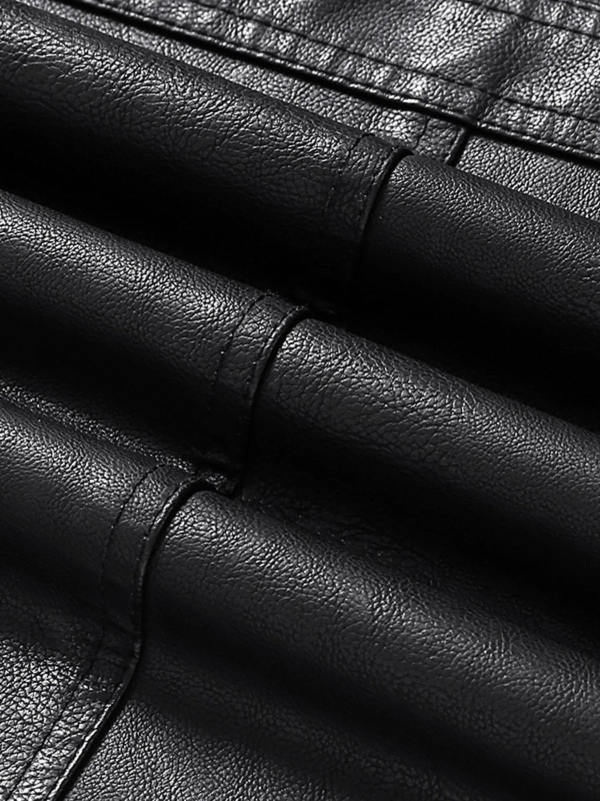 Men’s black vegan leather jacket seam and stitching close-up detail