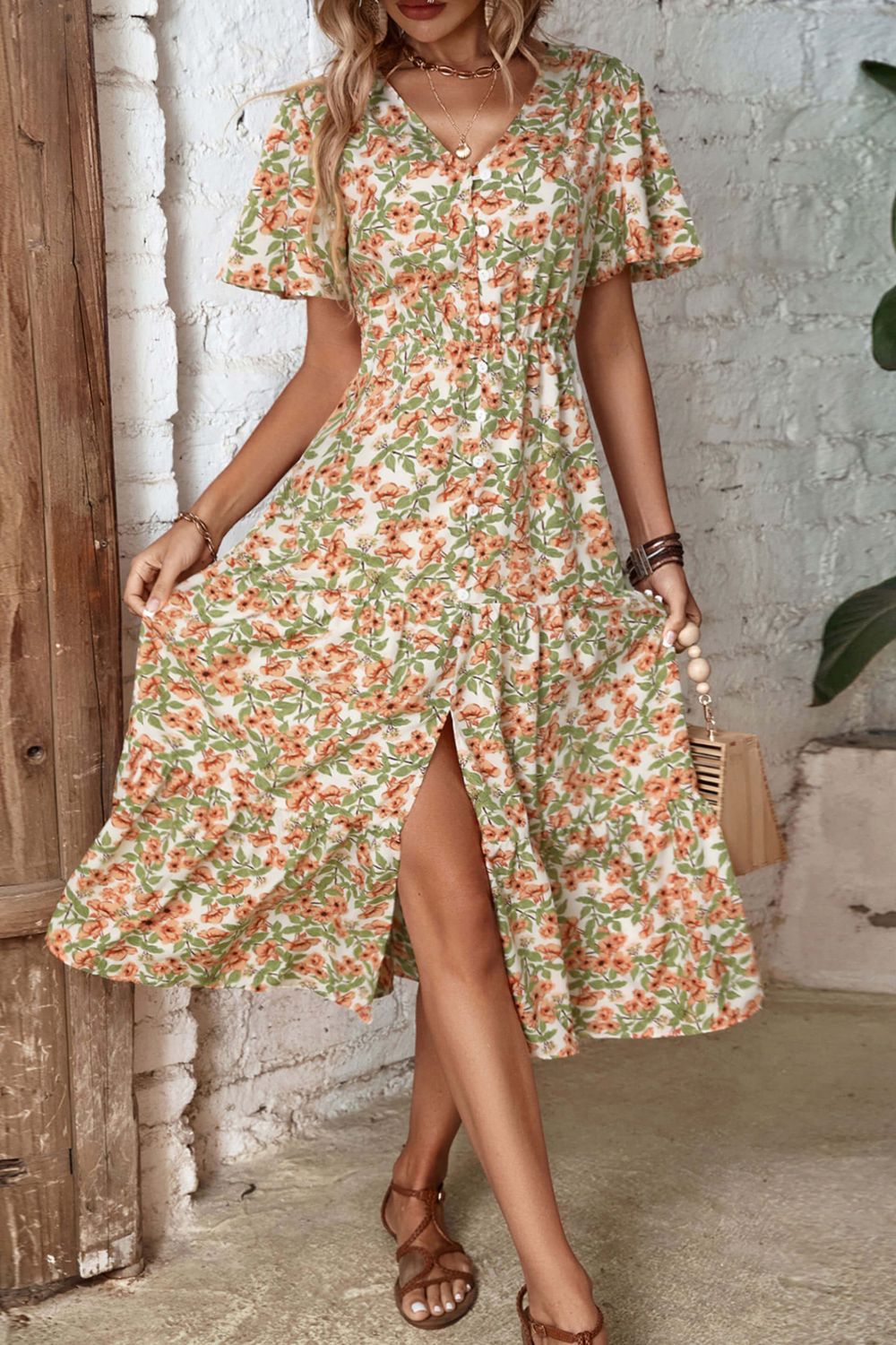 Floral V-neck front slit dress with short flutter sleeves