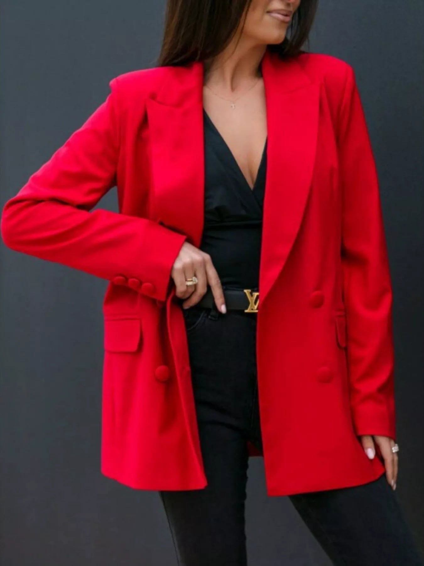 Red long-sleeve blazer with lapel collar and buttoned cuffs