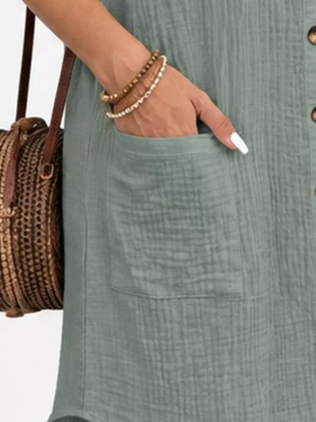 Sage green textured shirt dress with side pocket opening