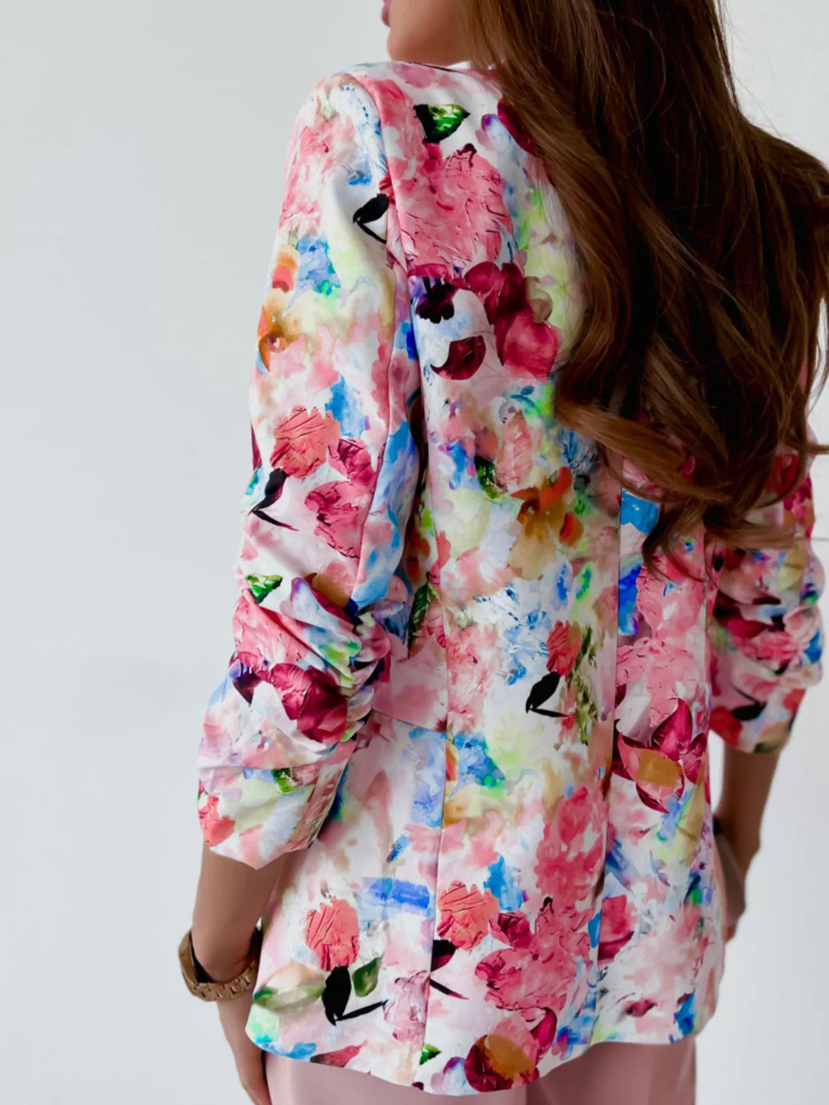 Floral print open-front blazer with patch pockets, back view, pink and blue tones, 3/4 sleeves