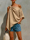 Khaki one-shoulder blouse with knotted shoulder detail and draped asymmetrical hem