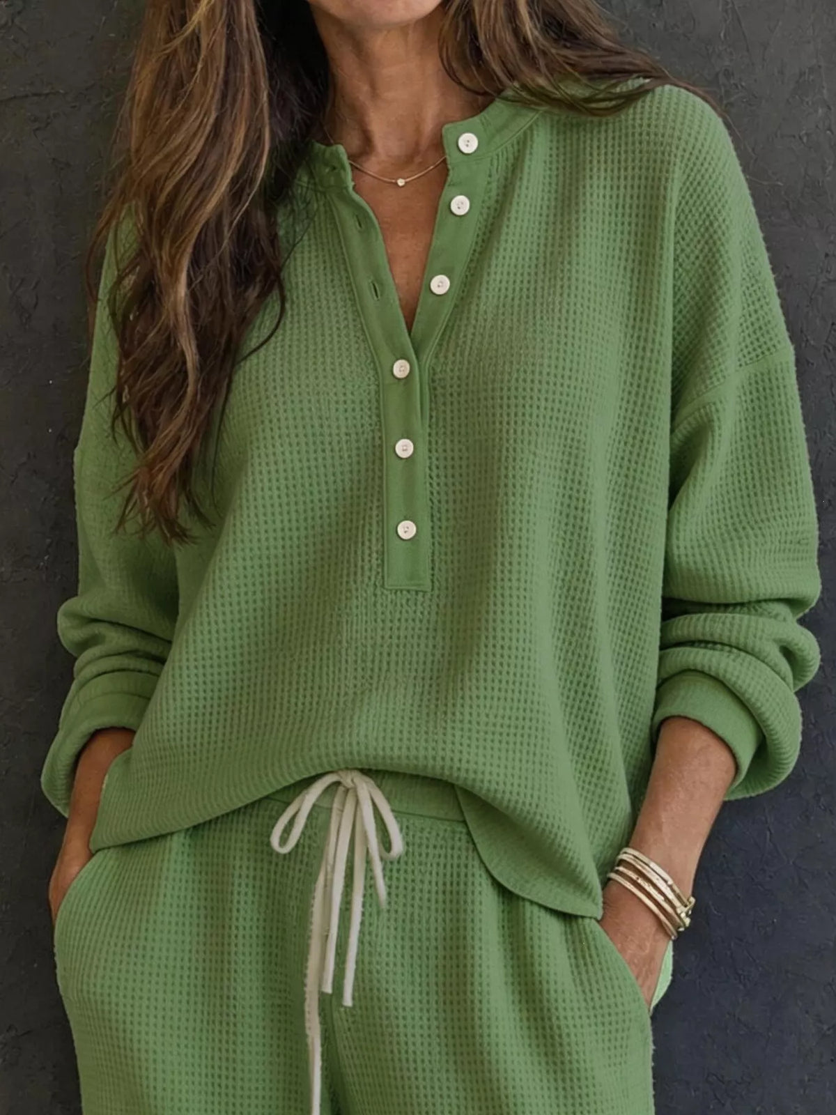 Waffle knit lounge set in green: henley pullover with button placket and drawstring pants