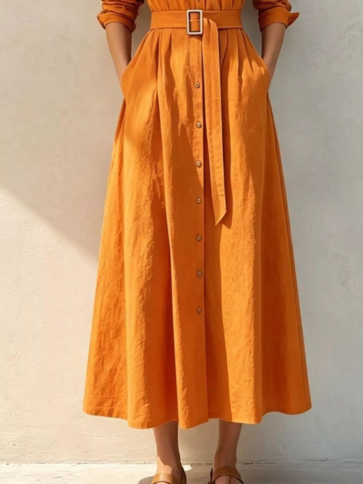 Tangerine midi shirt dress with button placket, belt buckle, and front tie