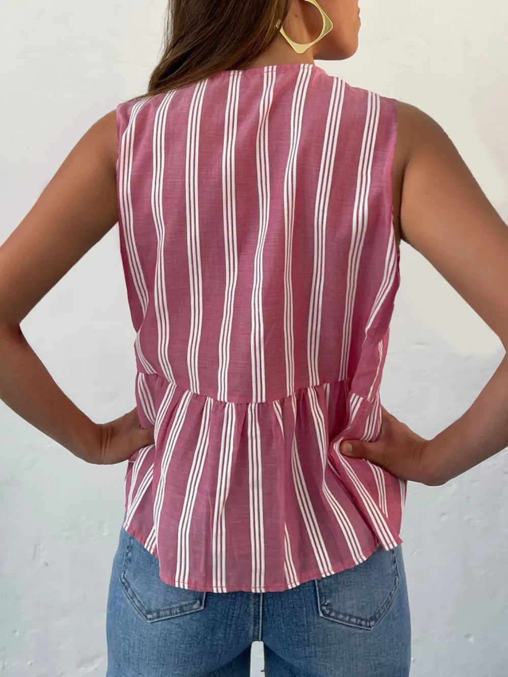 Striped round-neck tank top back, pink with white vertical stripes, tied waist