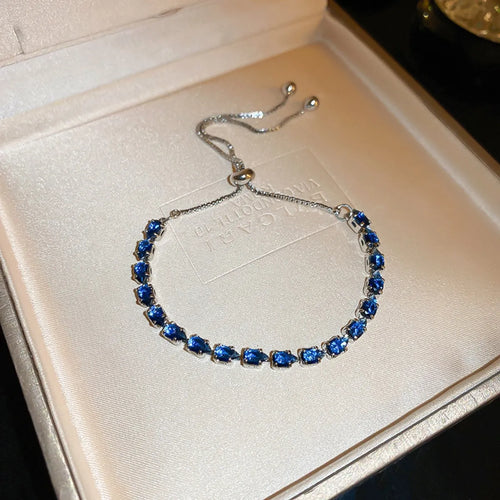 Zircon bracelet with royal blue crystal beads, silver-tone adjustable clasp