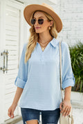 Light blue swiss dot blouse with Johnny collar, button front, 3/4 sleeves