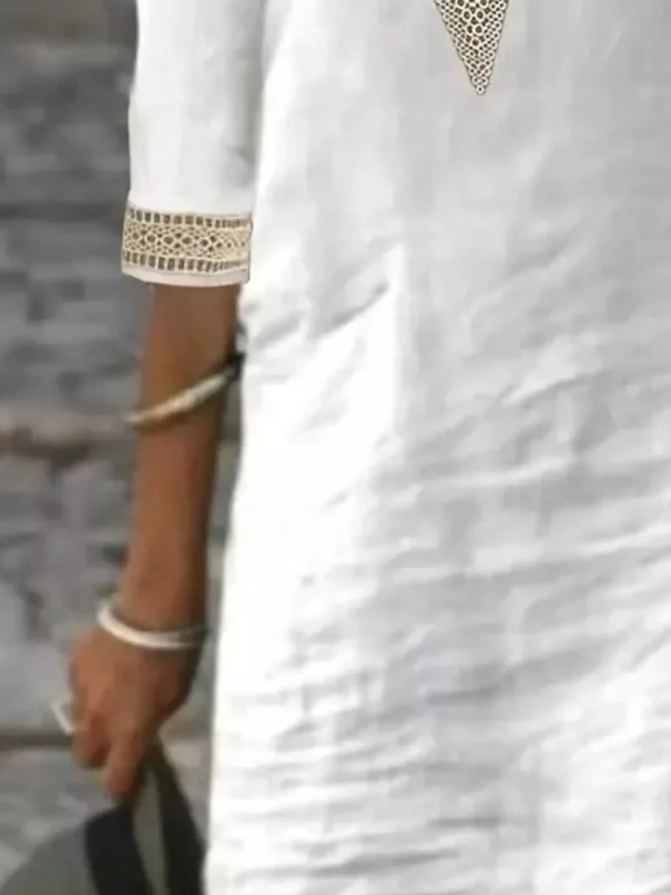 White V-neck lace-trim half-sleeve dress, shown from mid-torso to hem