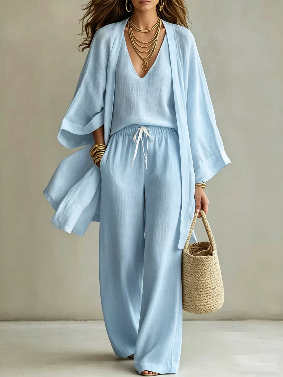 Sky blue three-piece set with V-neck top, drawstring wide-leg pants, and open cardigan