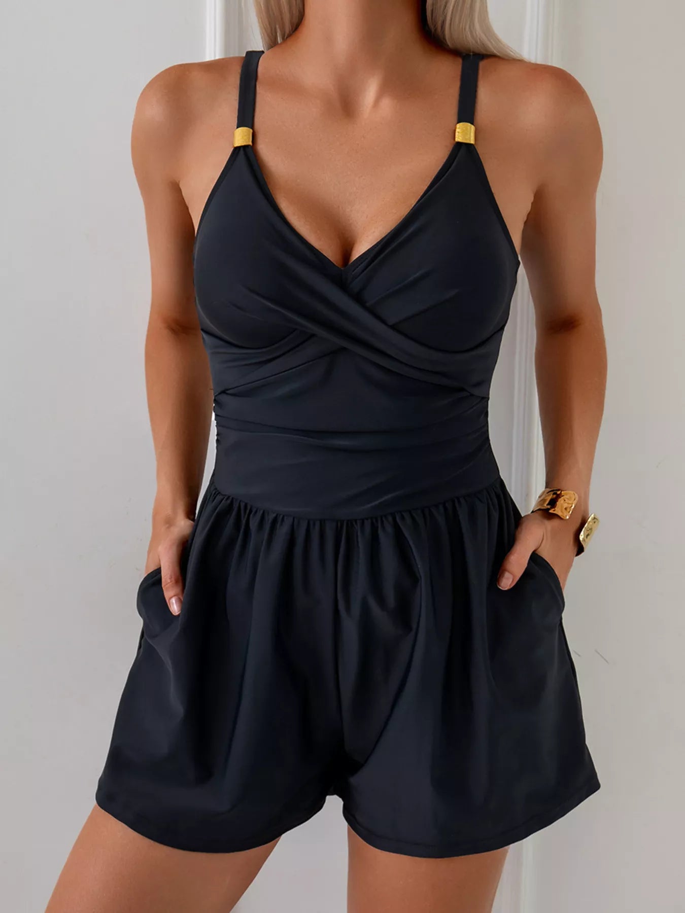 V-Neck Spaghetti Strap One-Piece Swimsuit in black with twist-front and pockets
