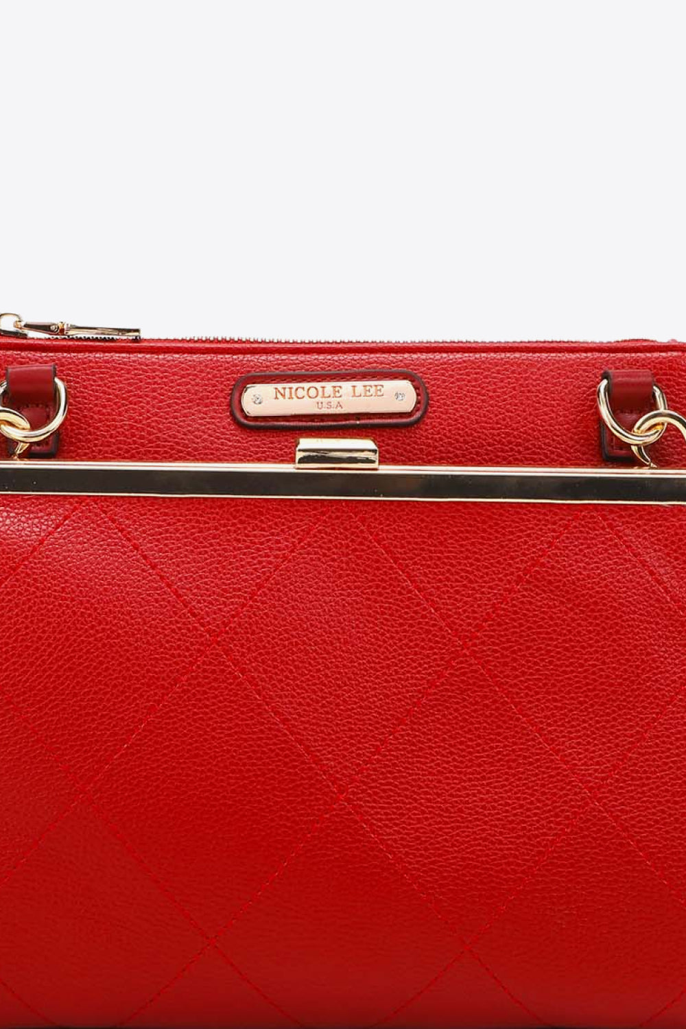 Red quilted handbag with Nicole Lee USA label, metal clasp and gold tone rings