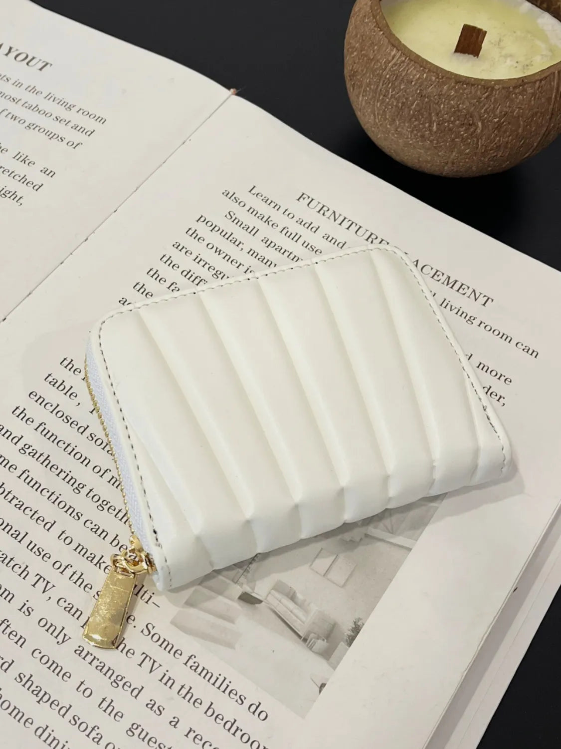 White mini vegan leather wallet with quilted front and gold zipper
