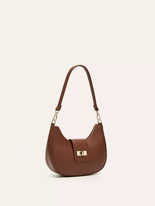 Brown buckle-closure shoulder bag with curved hobo shape and gold chain handles