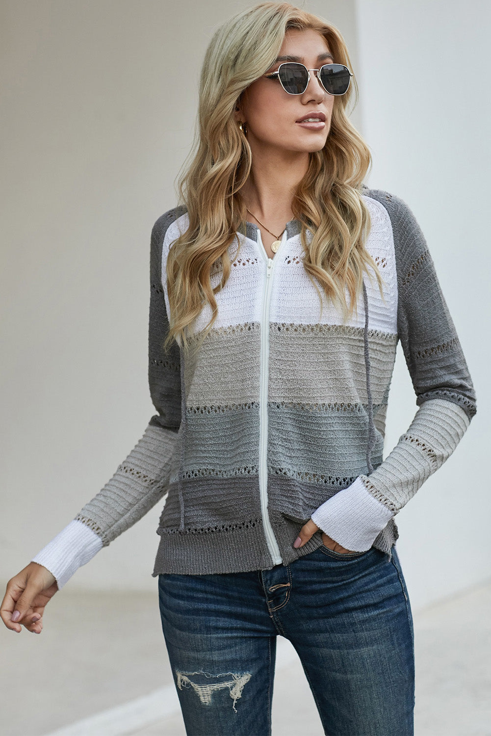 Gray zip-up hooded cardigan with openwork yoke, white stripes and ribbed sleeve cuffs
