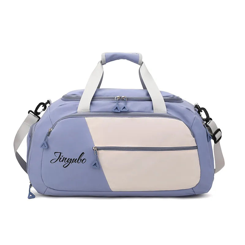 Large nylon travel duffel bag in periwinkle blue with contrast off-white front panel and side straps