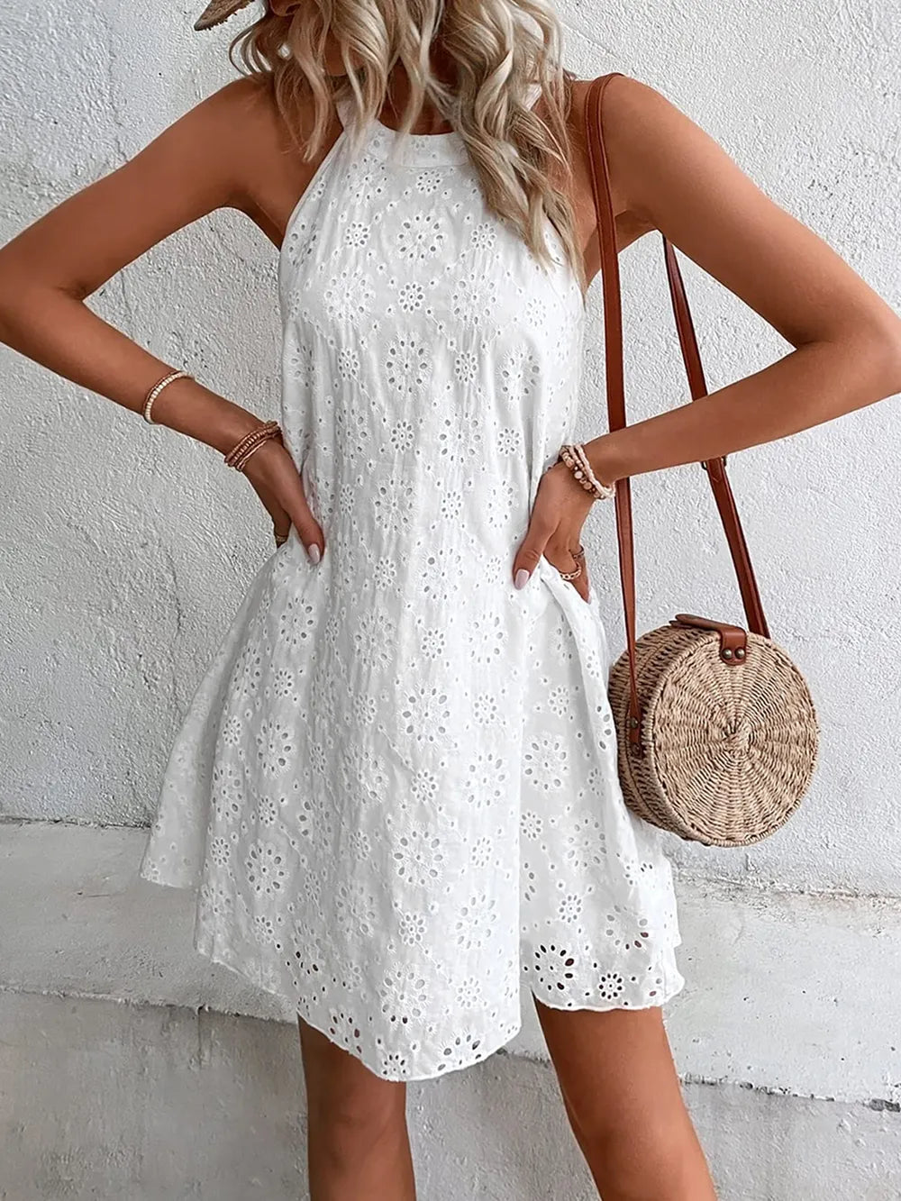 White eyelet mini dress, sleeveless Grecian neckline with scalloped embroidered pattern