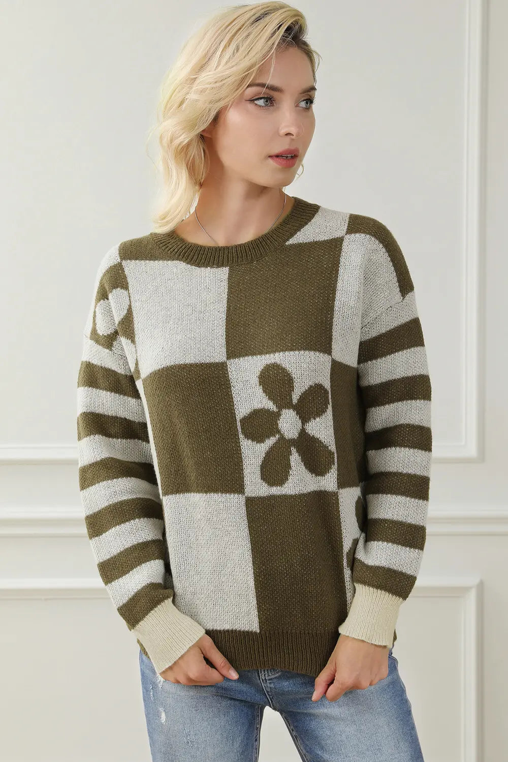 Front view of army green and cream contrast round neck long sleeve sweater with checker floral motif
