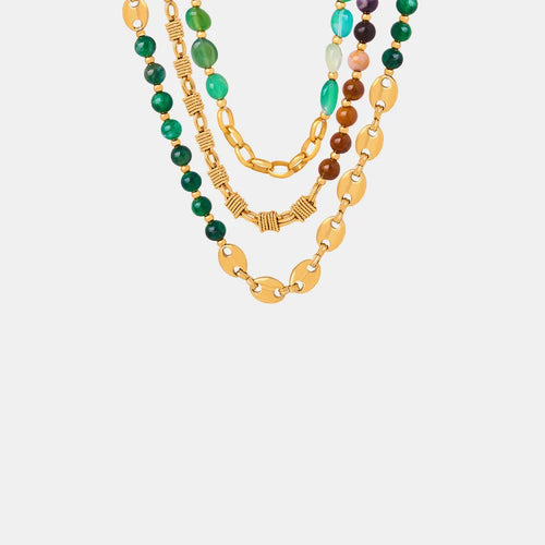 Layered beaded necklace with gold chain links and green, brown, and pastel beads