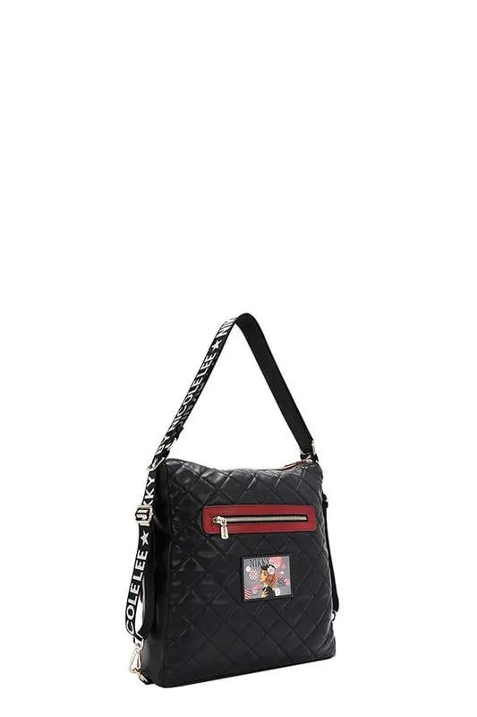 Convertible adjustable strap backpack bag, black quilted with red zipper accent and patterned strap.