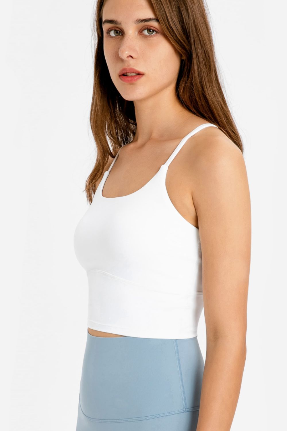 White scoop neck sports cami with thin straps and cropped length